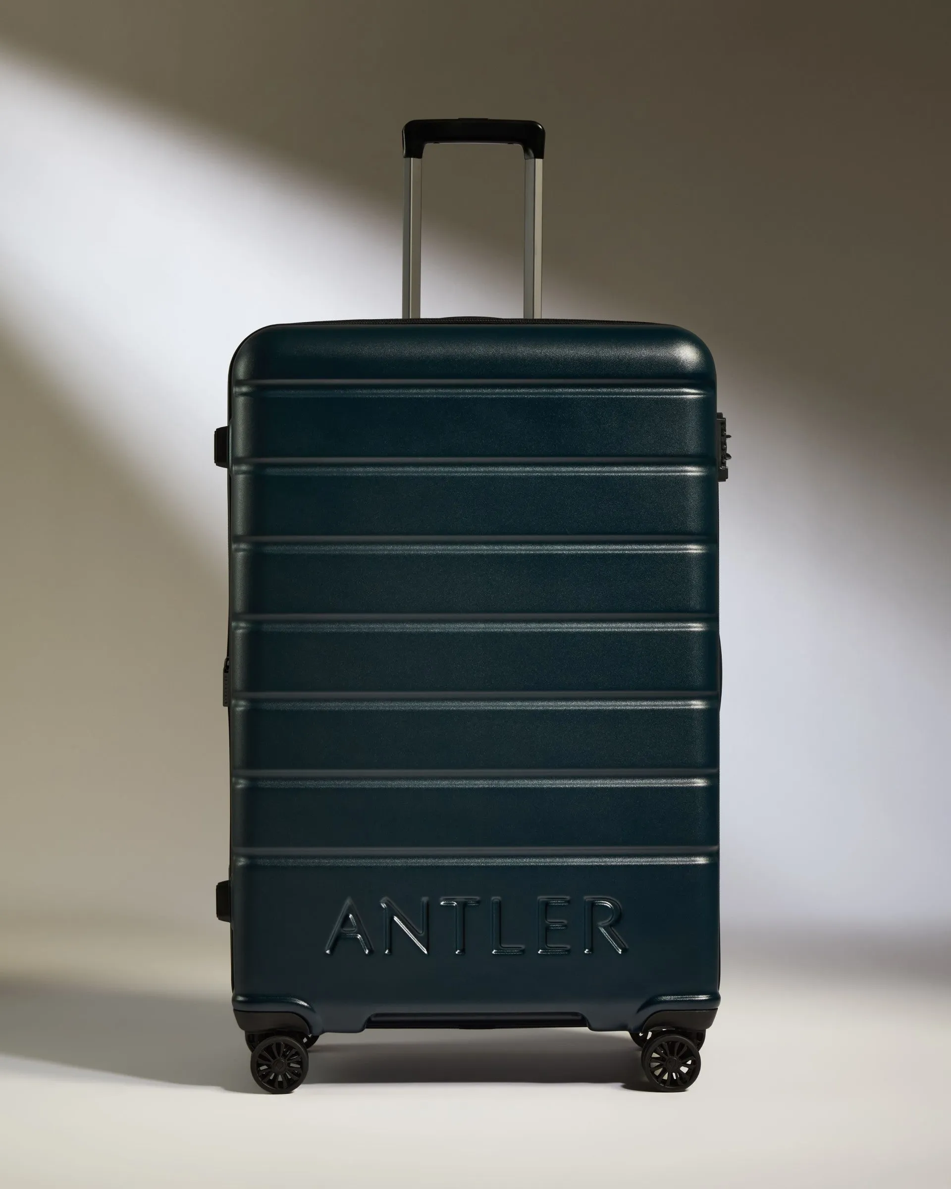 Large Suitcase in Midnight Blue - Logo