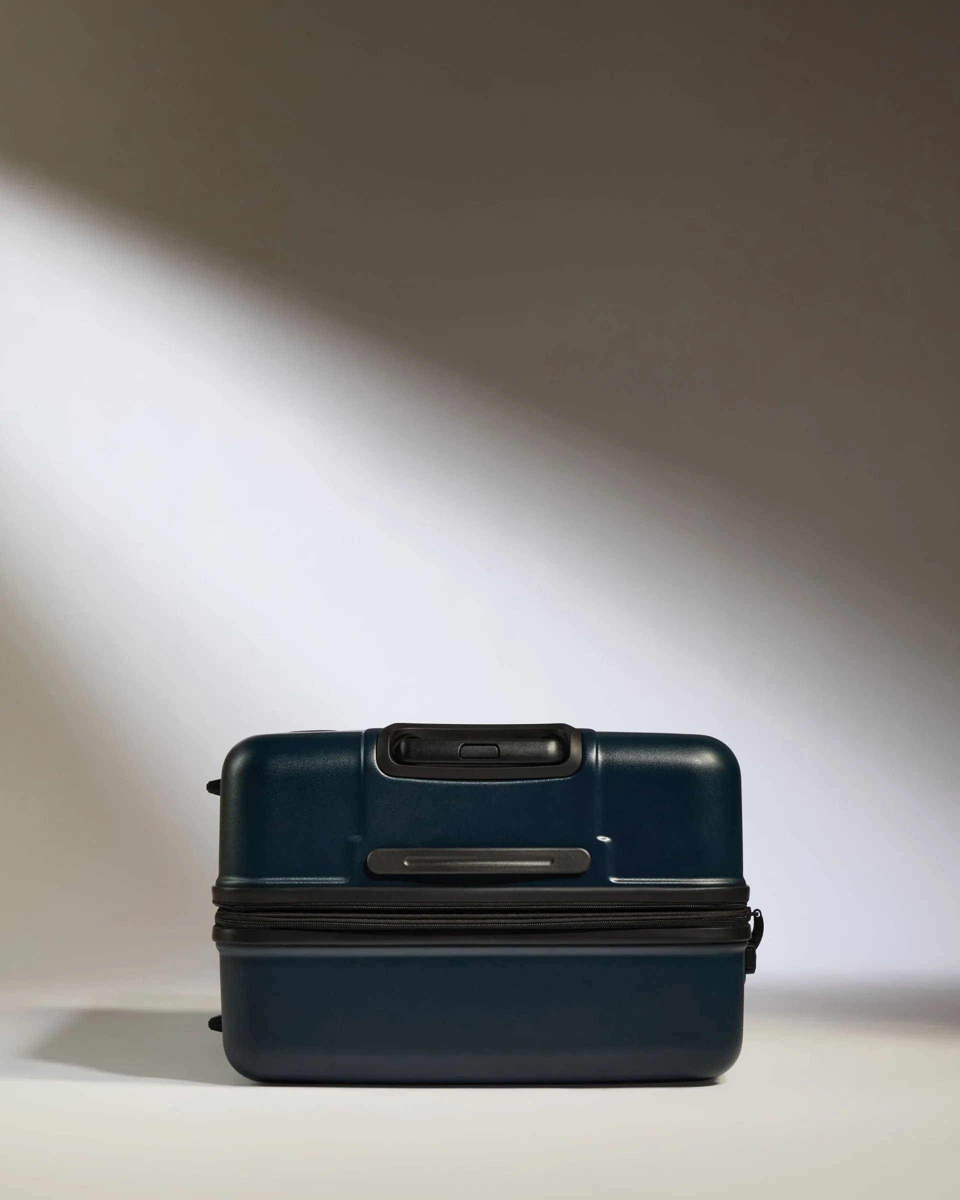 Large Suitcase in Midnight Blue - Logo